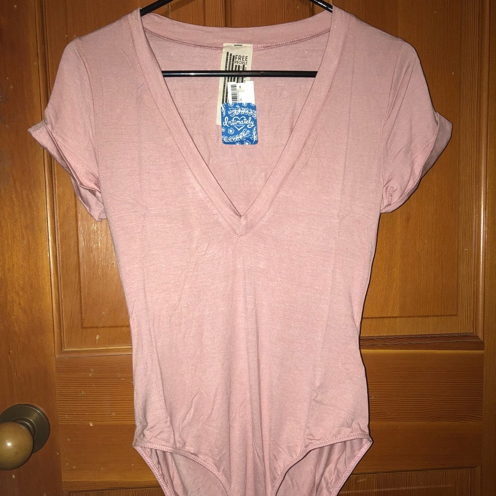 Pink bodysuit from free people!